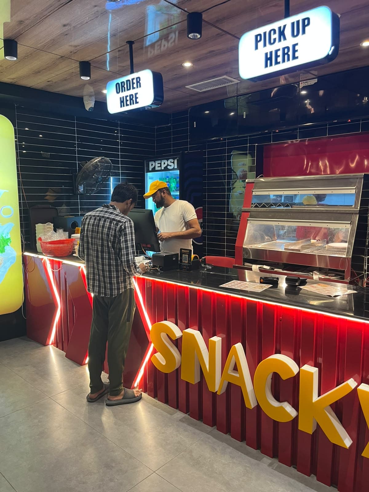 The Snacky order counter with its red LED edge and 3D lettering